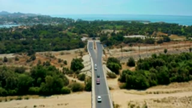 SAN JOSE DEL CABO MEXICO-2020: Highway Splits Upon Entering A Forested Area In