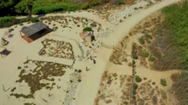 SAN JOSE DEL CABO MEXICO-2020: A Person Walking To A Small Shack Situated Beside