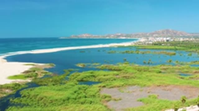 SAN JOSE DEL CABO MEXICO-2020: Sweeping Aerial View Of A Long Thin White Sandbar