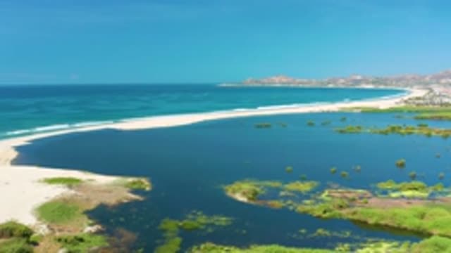 SAN JOSE DEL CABO MEXICO-2020: Blue Ocean Surrounded By Parts Of Land Some Land