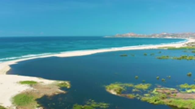 SAN JOSE DEL CABO MEXICO-2020: Ocean Waves Crash Into Beach Facing Another Body