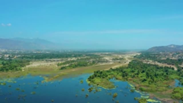 SAN JOSE DEL CABO MEXICO-2020: Aerial View Of The Swampy Marshland Near A Hilly