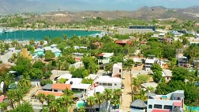 SAN JOSE DEL CABO MEXICO-2020: Camera Slowly Panning Above A Small Tropical Town