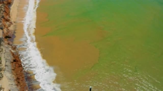 SAN JOSE DEL CABO MEXICO-2020: View From Above Of Sandy Sea Waves Breaking On Cliffs