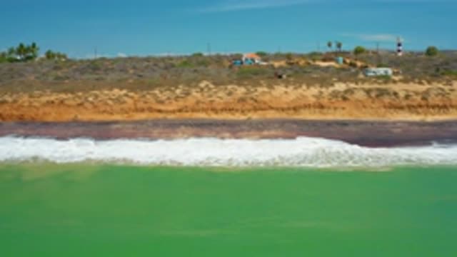 SAN JOSE DEL CABO MEXICO-2020: Sea Waves Hitting Black Sand Beach