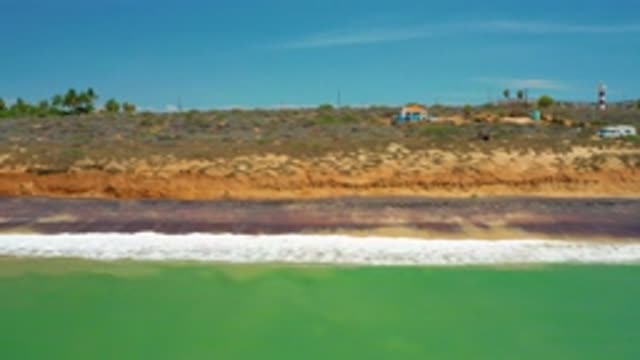 SAN JOSE DEL CABO MEXICO-2020: White Waves From Green Sea Crashing Into Desolate