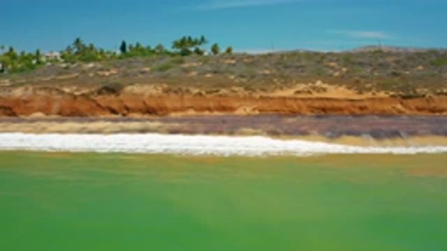 SAN JOSE DEL CABO MEXICO-2020: Peaceful Waves Roll Onto the Shore