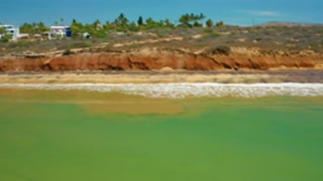 SAN JOSE DEL CABO MEXICO-2020: A Slow Motion Panning Of A Mountainous And Steep Coastline