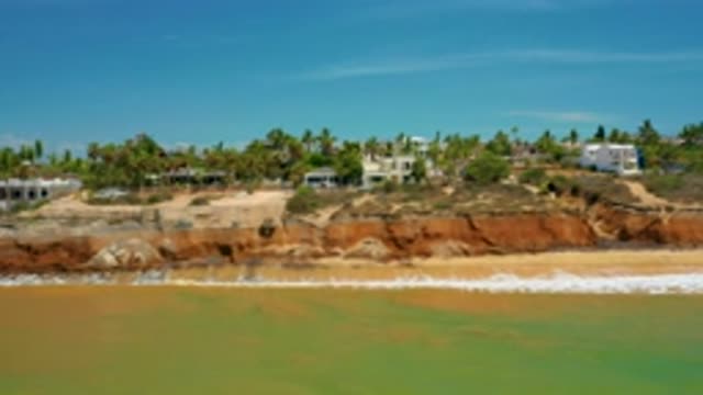 SAN JOSE DEL CABO MEXICO-2020: Aerial Shot Of A Beach Scene With Waves Crashing