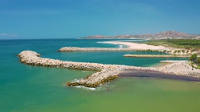 SAN JOSE DEL CABO MEXICO-2020: Waves Of Clear Blue Water Washing Up On The Shore