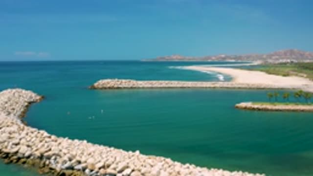 SAN JOSE DEL CABO MEXICO-2020: Two Rock Seawalls Form A Small Harbor