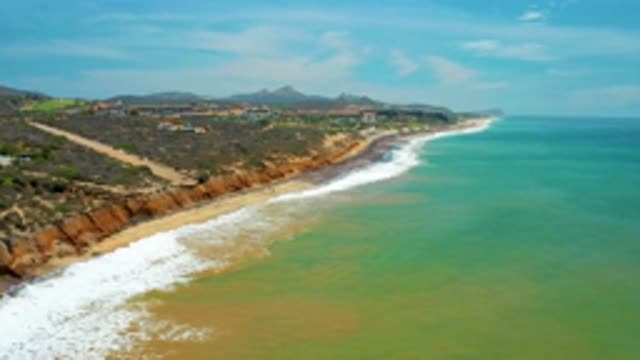 SAN JOSE DEL CABO MEXICO-2020: Trail Of Rocky Cliff Drop To Beautiful Sandy Beach