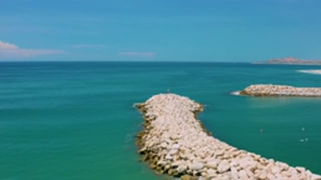 SAN JOSE DEL CABO MEXICO-2020: Flyover Of A Rocky Jetty On The Ocean