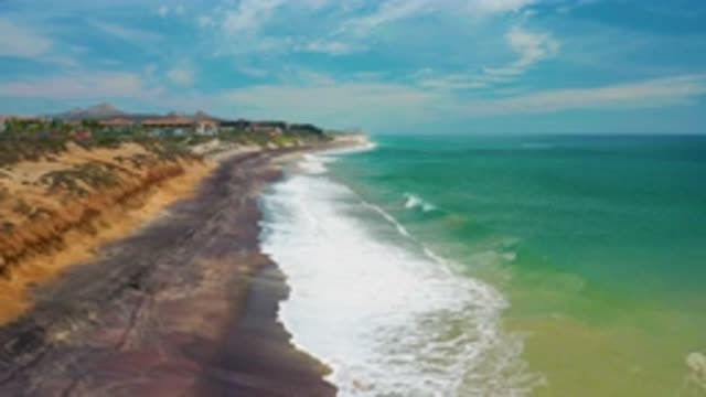 SAN JOSE DEL CABO MEXICO-2020: Green And Blue Sea White Waves Breaking On Rocky