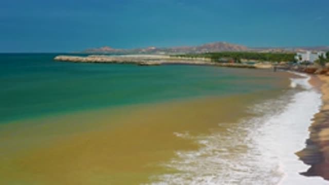 SAN JOSE DEL CABO MEXICO-2020: Sea Waves With Foam Reach Beach Looks Beautiful