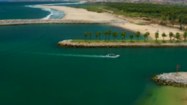 SAN JOSE DEL CABO MEXICO-2020: Streamer Boat Running In The Blue Sea Water