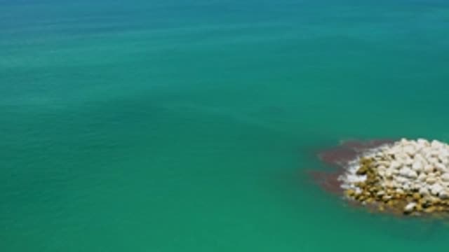 SAN JOSE DEL CABO MEXICO-2020: Aerial View Of White Rocks In Middle Of Green