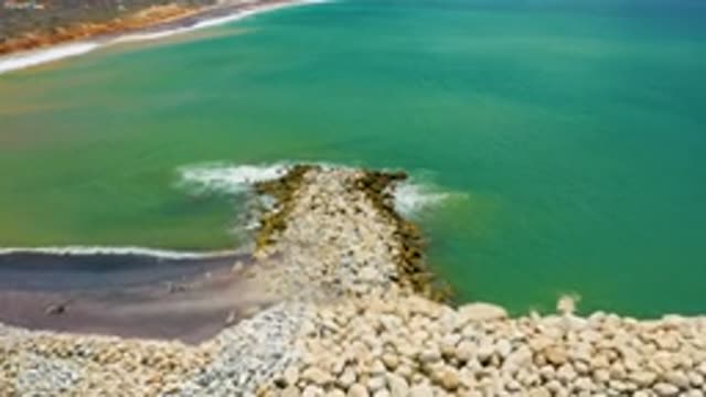SAN JOSE DEL CABO MEXICO-2020: Green And Blue Sea Water Mild Waves Hitting