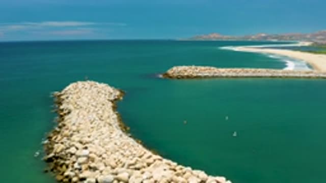 SAN JOSE DEL CABO MEXICO-2020: Hard White Stones Arranged Along the Blue Beach