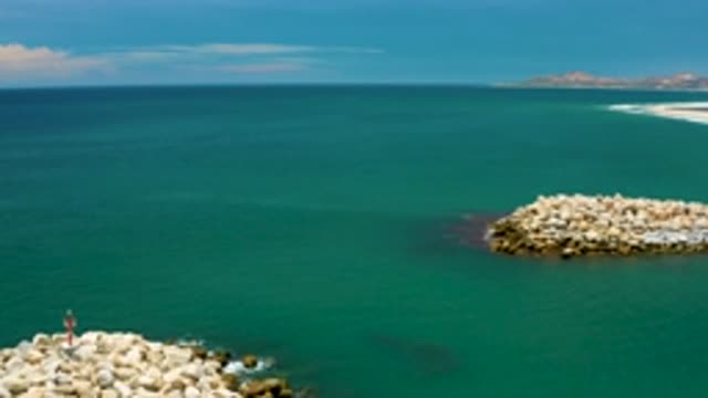 SAN JOSE DEL CABO MEXICO-2020: Aerial View Of Blue Green Sea With Small Rocky Islands