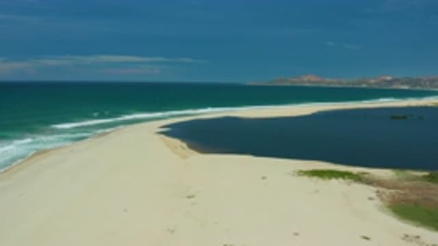 SAN JOSE DEL CABO MEXICO-2020: Mild Waves Coming With White Cloud Up Above