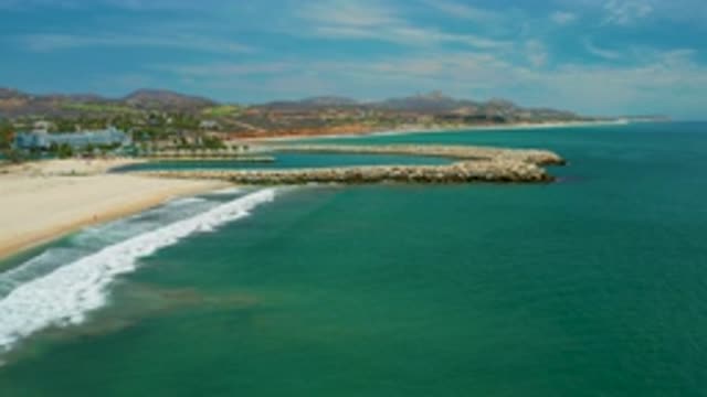 SAN JOSE DEL CABO MEXICO-2020: A Beach With A Circle Shaped Rock Structure