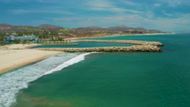 SAN JOSE DEL CABO MEXICO-2020: Zooming In On A Beach With Sand And Blue Waters