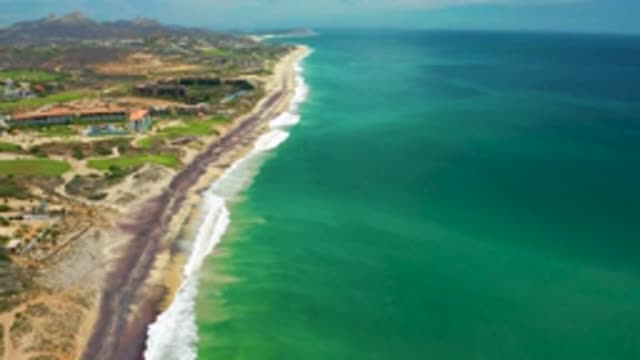 SAN JOSE DEL CABO MEXICO-2020: Beach Coastal Town Emerald Shores Pebbles Waves