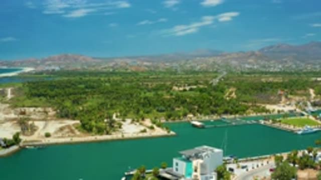 SAN JOSE DEL CABO MEXICO-2020: White Ships In The Blue Water Sea Green Tall