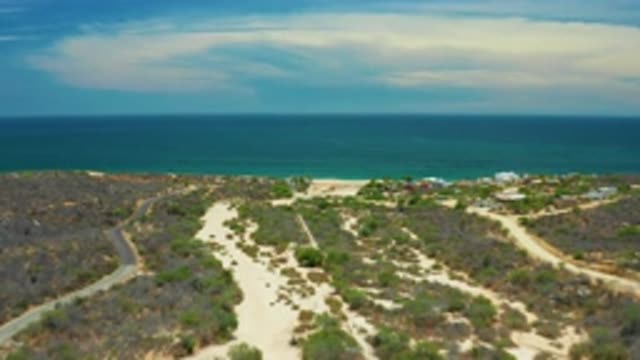 SAN JOSE DEL CABO MEXICO-2020: A Wide View Of A Beach Terrain Going Into The Ocean