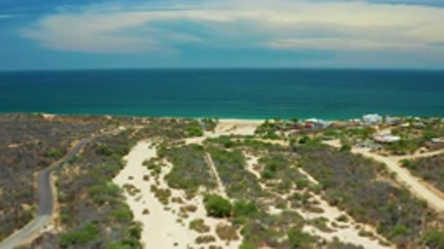 SAN JOSE DEL CABO MEXICO-2020: A Sea View Near A Land Filled With Trees