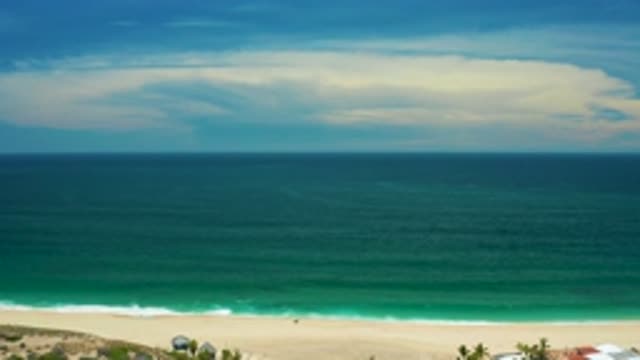 SAN JOSE DEL CABO MEXICO-2020: Camera Facing The Ocean With Clouds On The Horizon