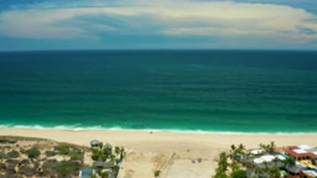 SAN JOSE DEL CABO MEXICO-2020: Junction Of Green Water Sea And Blue Sky On The