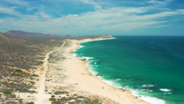 SAN JOSE DEL CABO MEXICO-2020: Beautiful Beach With Green Sea Surrounded By Blue Sky