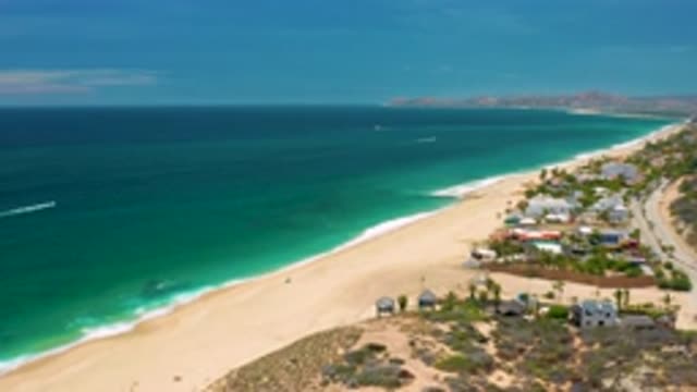SAN JOSE DEL CABO MEXICO-2020: A Camera Or Aircraft Flying Above The Ocean