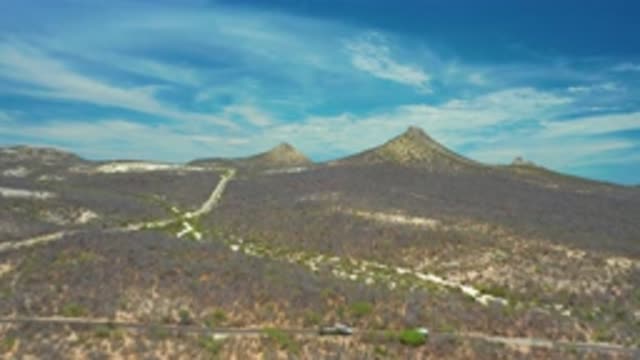 SAN JOSE DEL CABO MEXICO-2020: High Mountains With A Cloudy Blue Sky And A