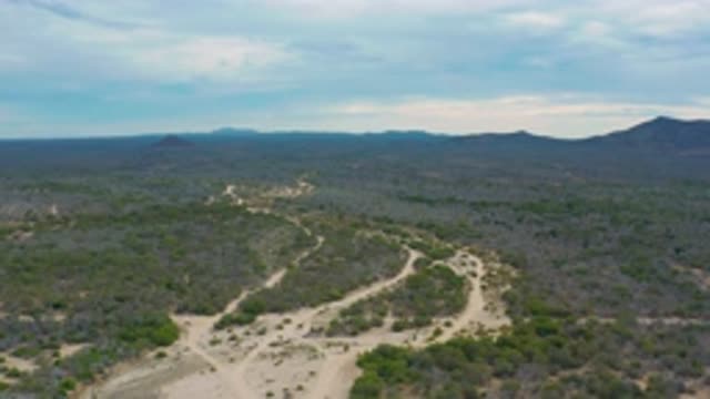 LAGUNA BEACH BCS MEXICO-2020: Vast Sky With White Clouds and Tall Mountains