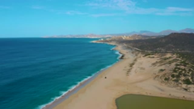 LAGUNA BEACH BCS MEXICO-2020: Bird's Eye View Of A Beach With Mountains Off In The Distance