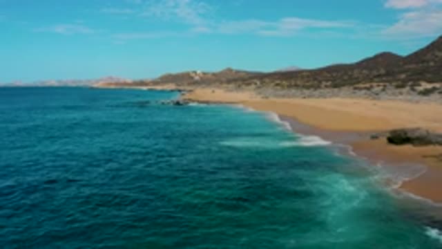 LAGUNA BEACH BCS MEXICO-2020: Waves Crashing Into Sandy Beach