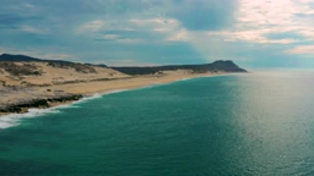 LAGUNA BEACH BCS MEXICO-2020: White Cloud in the Vast Blue Sky Over Crystal Sea
