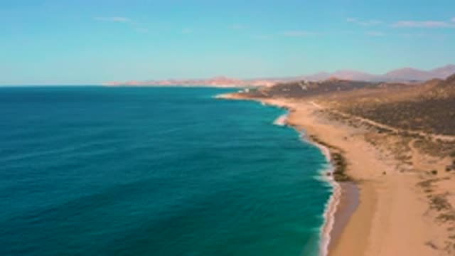 LAGUNA BEACH BCS MEXICO-2020: Blue Waves Capped in White Wash Upon Sandy Beach