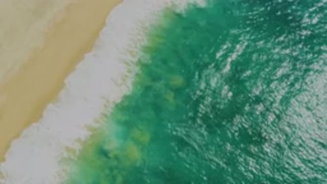 LAGUNA BEACH BCS MEXICO-2020: Green Sea Waves Breaking At The Beach Sand At
