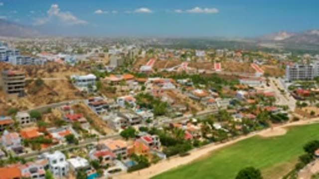 PALMILLA BEACH BCS MEXICO-2020: Multi-Colorful Houses And Buildings Perched On A Hilltop
