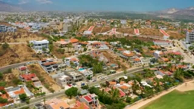 PALMILLA BEACH BCS MEXICO-2020: Panning View Across A Desert Town With Mountains