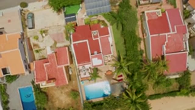 PALMILLA BEACH BCS MEXICO-2020: Aerial Rotating View Of Homes With Swimming Pools