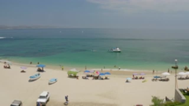 PALMILLA BEACH BCS MEXICO-2020: People Sitting On The Beach Under Their Umbrellas