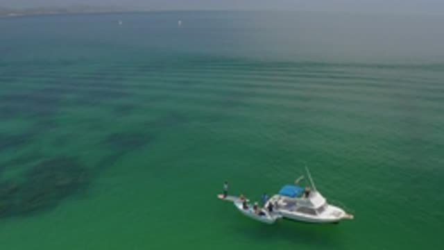PALMILLA BEACH BCS MEXICO-2020: Flying Over A Boat And People To Reveal A Waving
