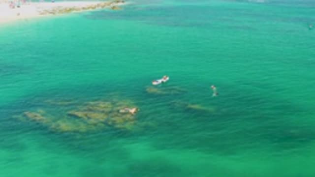 PALMILLA BEACH BCS MEXICO-2020: Sky View Of Ocean Water With Rowing Boats In It