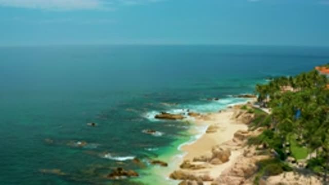 PALMILLA BEACH BCS MEXICO-2020: Sea Waves Breaking In The Rocks At The Bottom Of