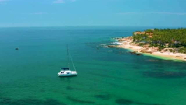 PALMILLA BEACH BCS MEXICO-2020: Little White Natch Anchored Off A Small Tropical Island